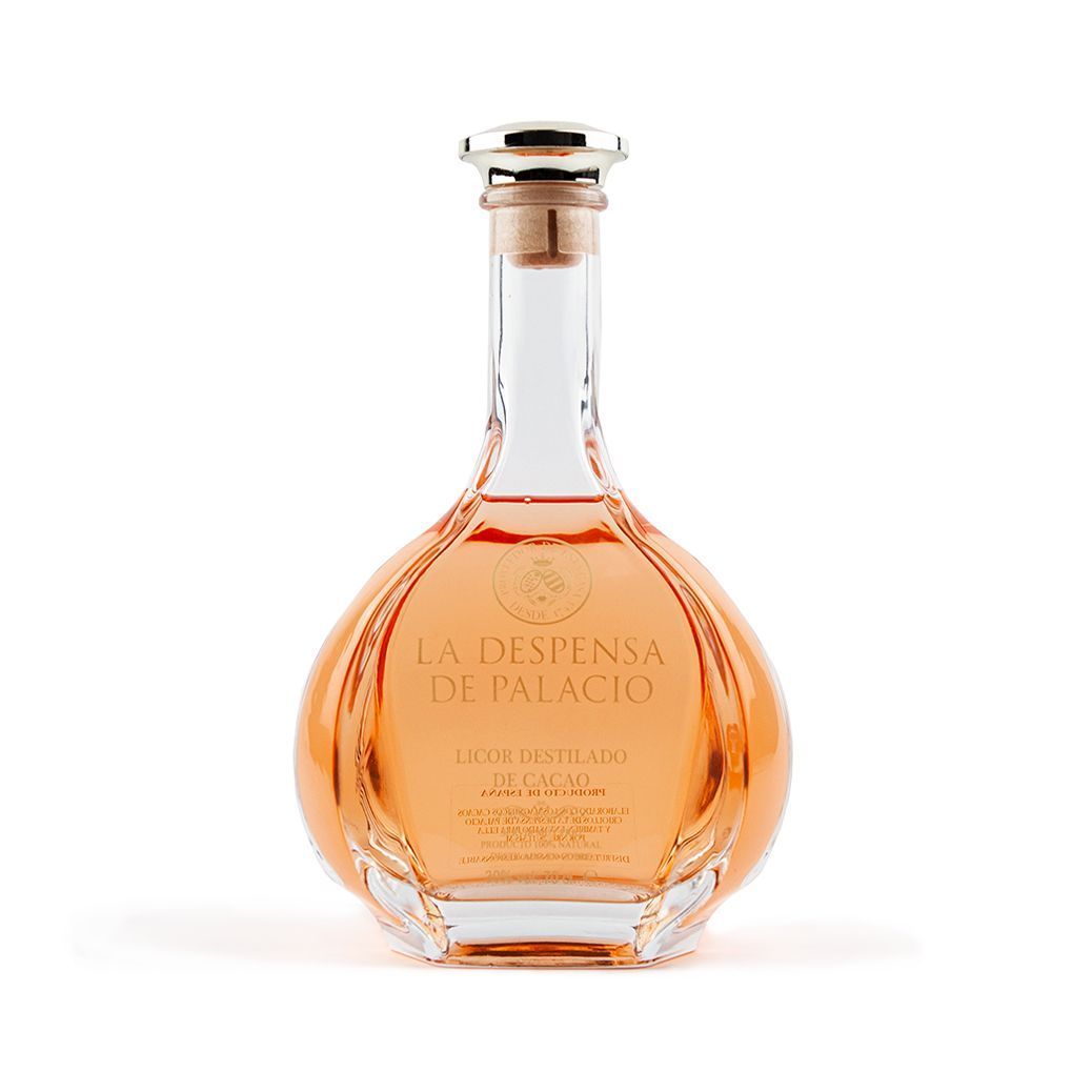 Licor Destilado de Cacao artesanal en botella de cristal con color dorado